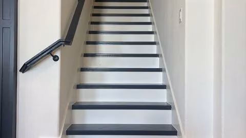Engineered floating staircase with concealed steel support by FJR