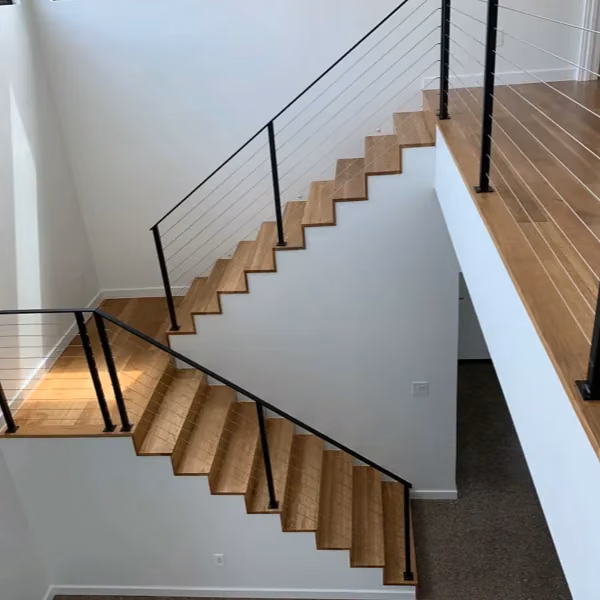 Custom staircase & railing by FJR Stair & Door in a DFW home
